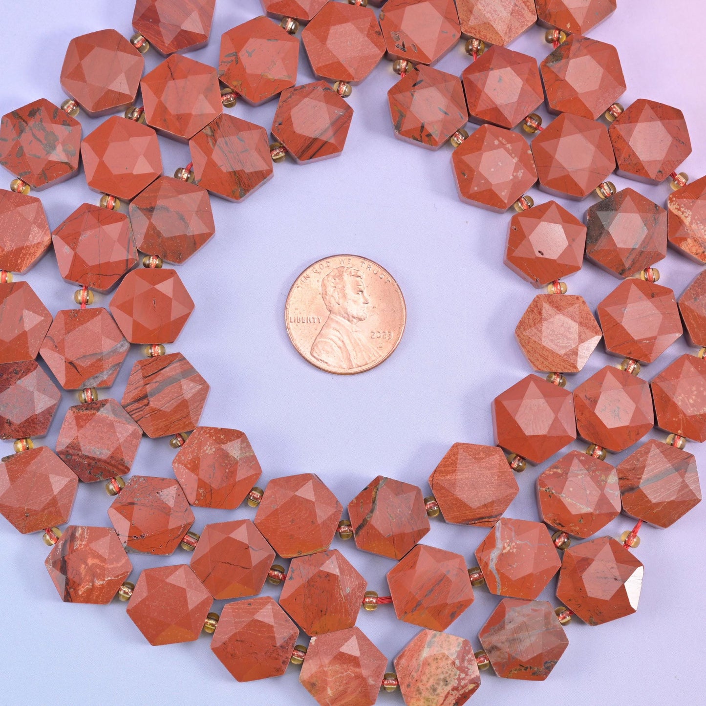 Red Jasper Flat Faceted Hexagon Beads, crisp hexagon outlines cut from warm brick-red jasper flecked with tan, rust and soft grey veining