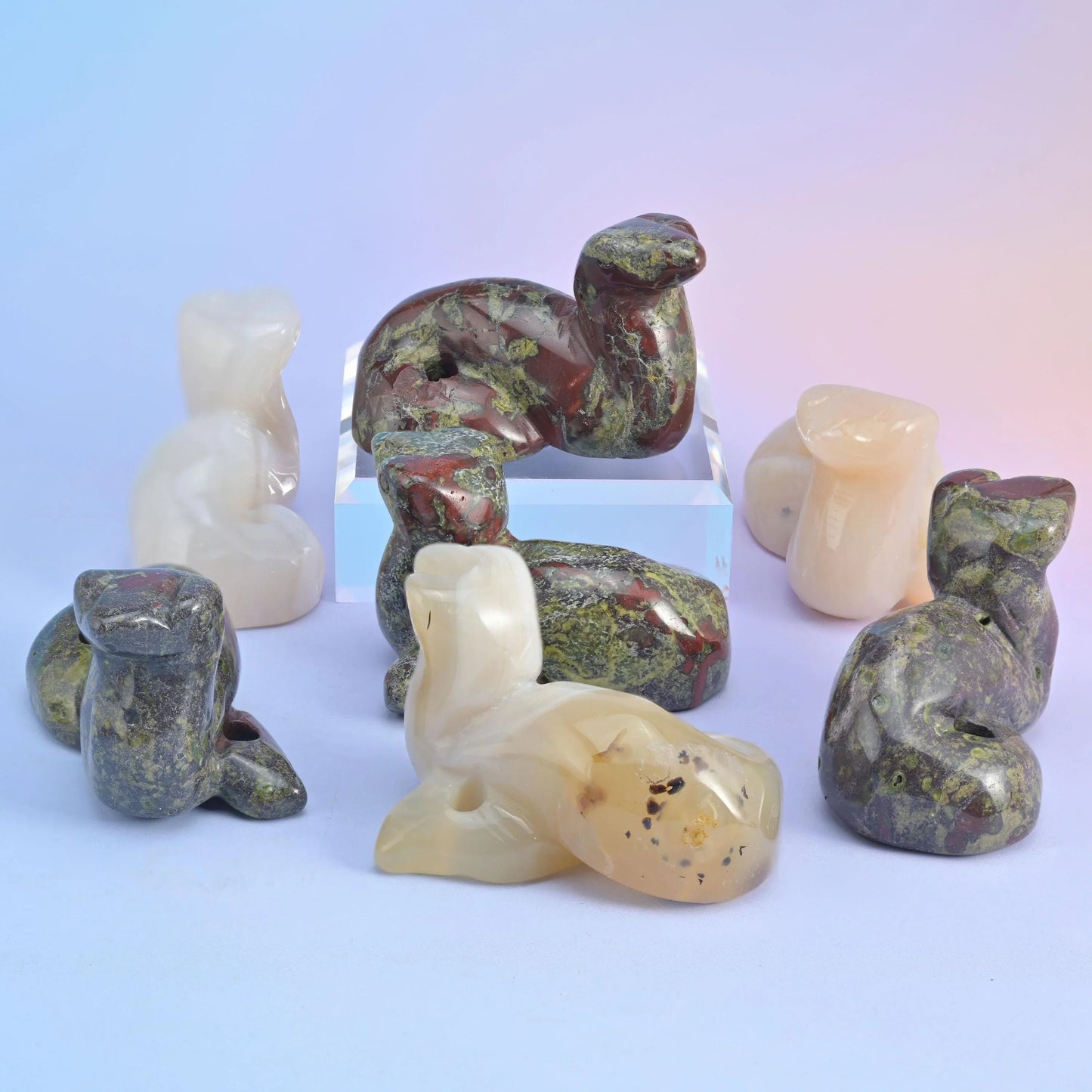 Dragonblood stone snake figurines in olive green flecked with deep red