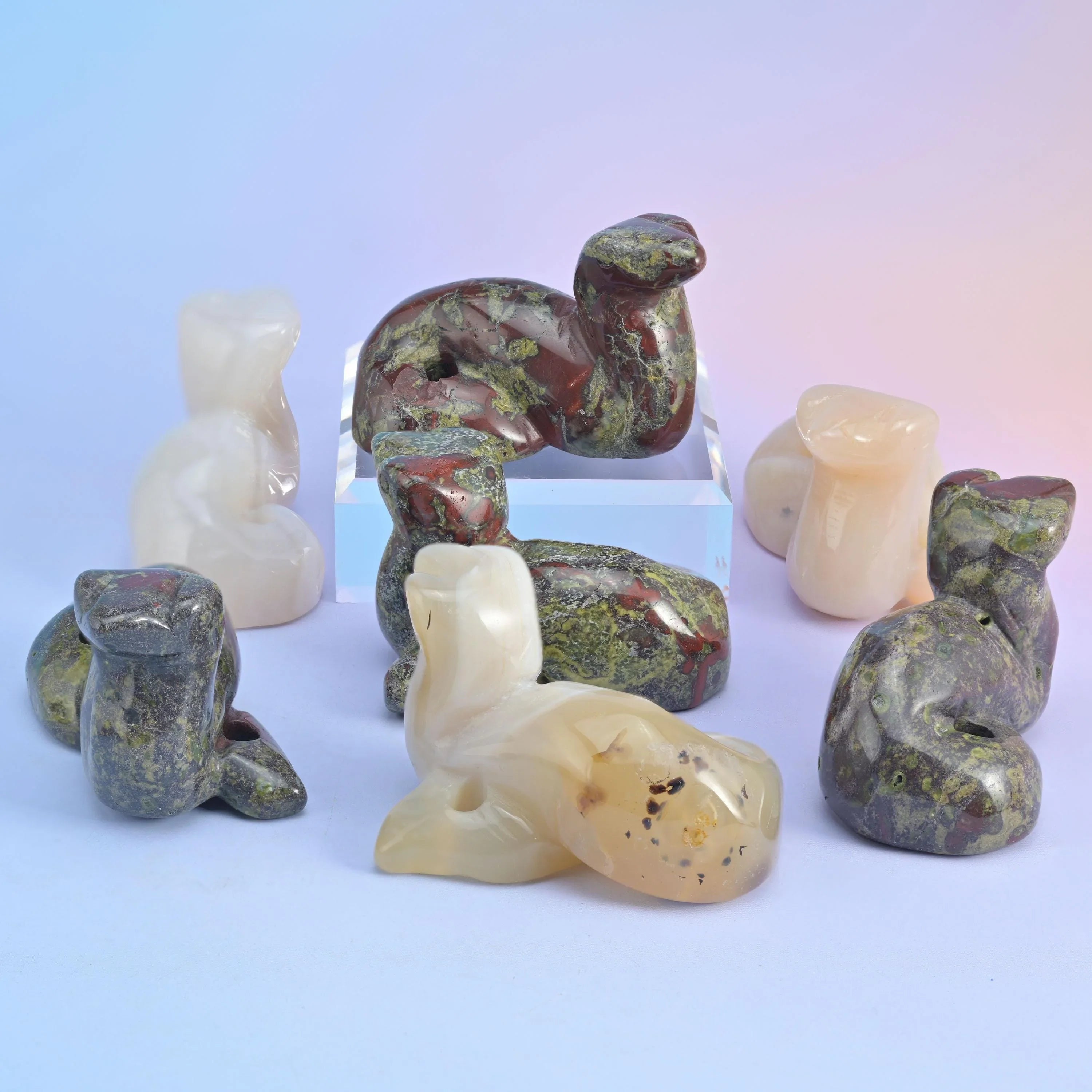 Dragonblood stone snake figurines in olive green flecked with deep red