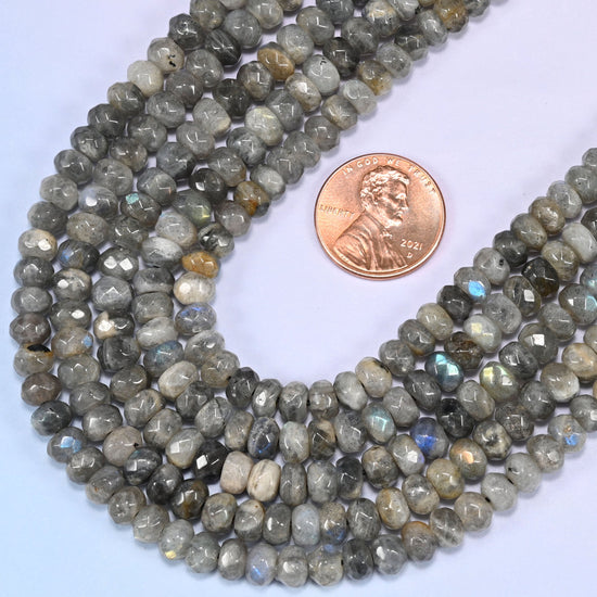 Gray Labradorite faceted rondelle beads in a deep loop, shown at their true size of 6x4mm