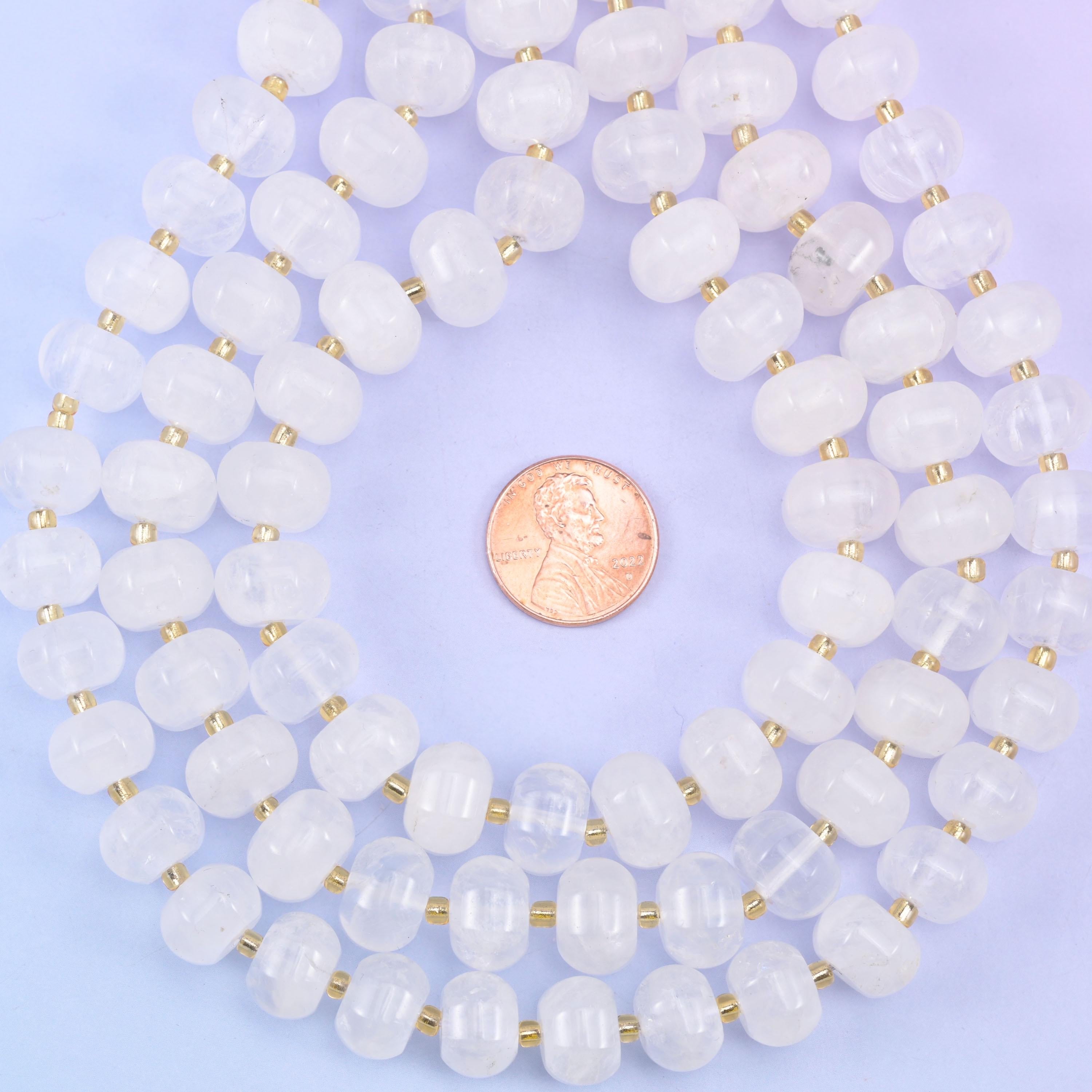 Coiled strands with a penny at the centre for a clear size comparison