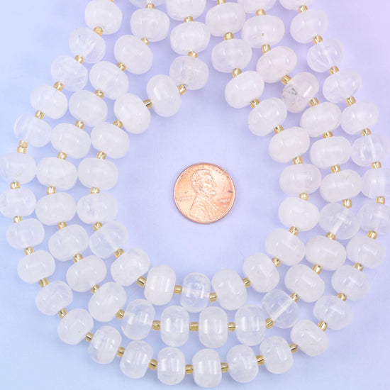 Coiled strands with a penny at the centre for a clear size comparison