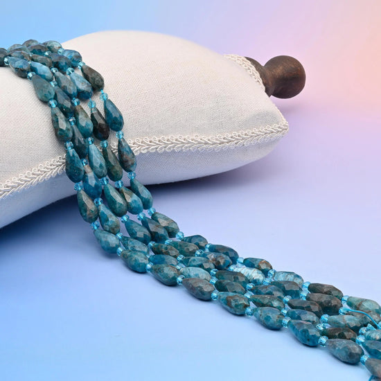 Natural Blue Apatite faceted teardrop beads, mottled petrol and teal blue