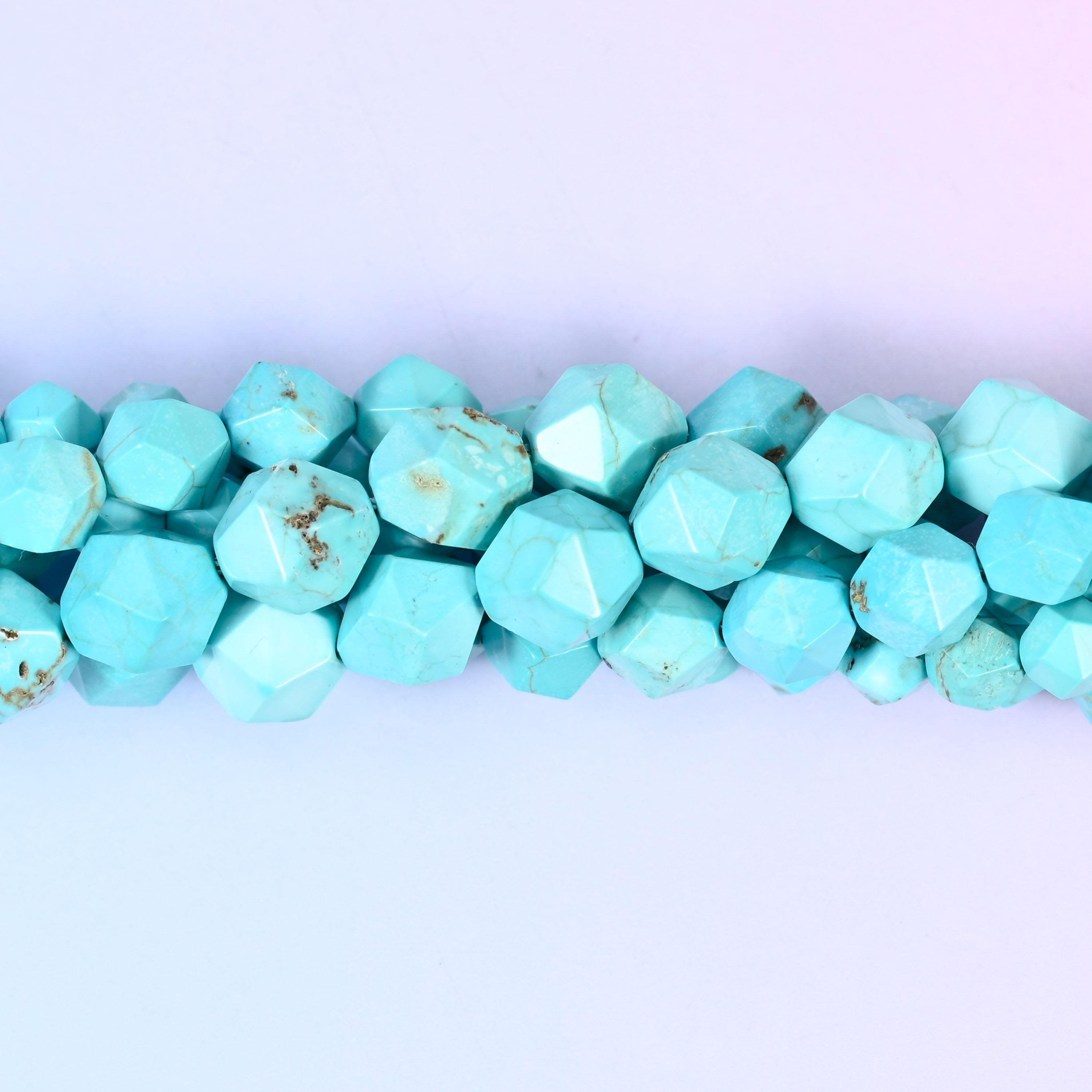 Dyed Blue Howlite Faceted Diamond Star Cut Beads, bright turquoise blue crossed by fine grey-brown matrix veining, cut into star facets