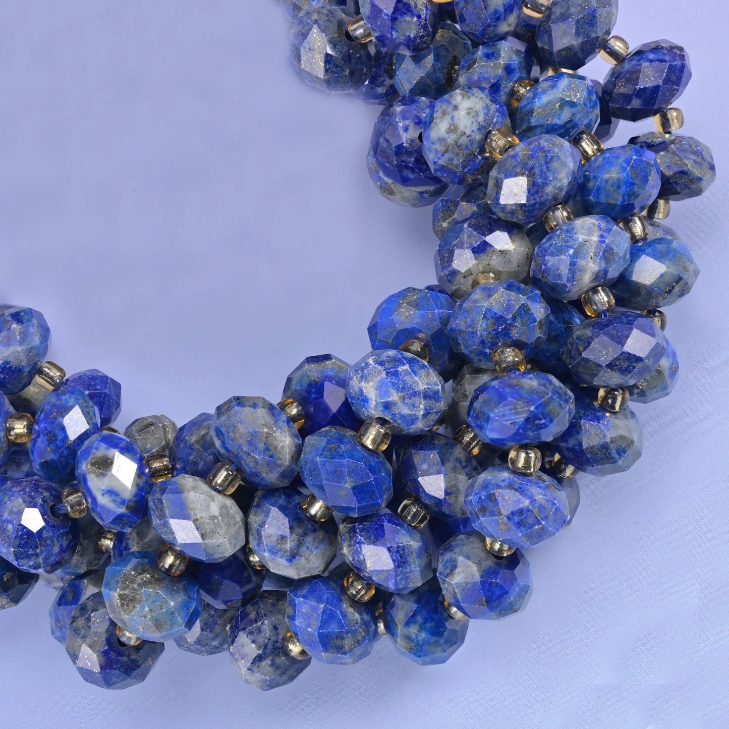 Faceted rondelle cut lapis lazuli beads