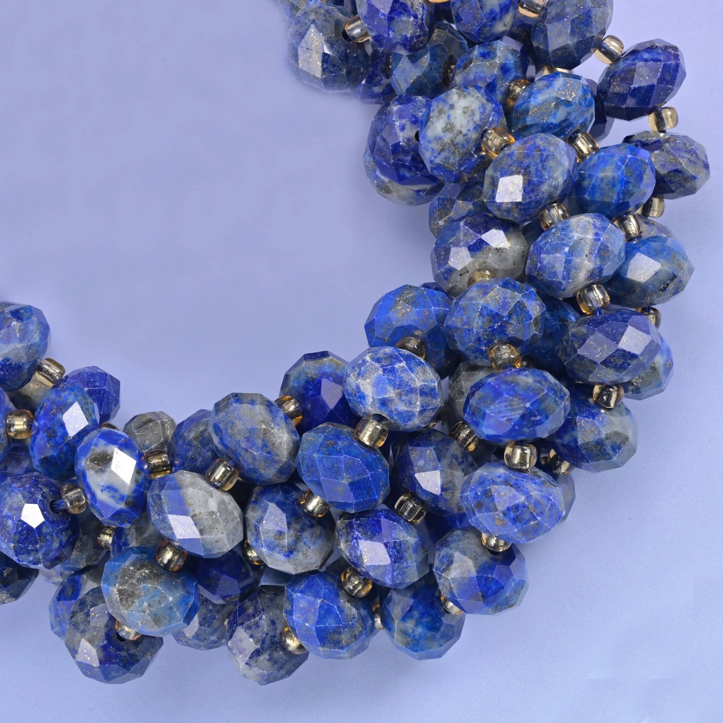 Faceted rondelle cut lapis lazuli beads