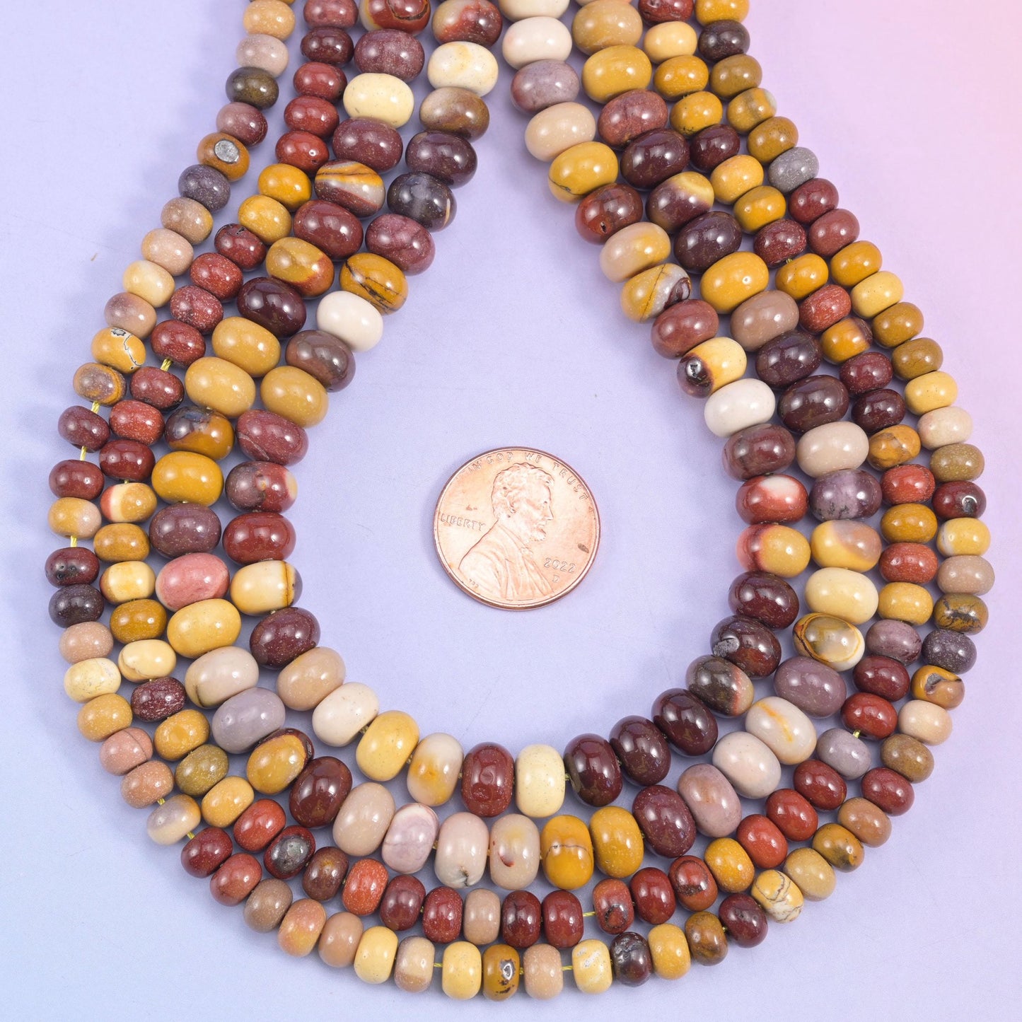 Mookaite Jasper rondelle beads, approximately 90 beads per strand