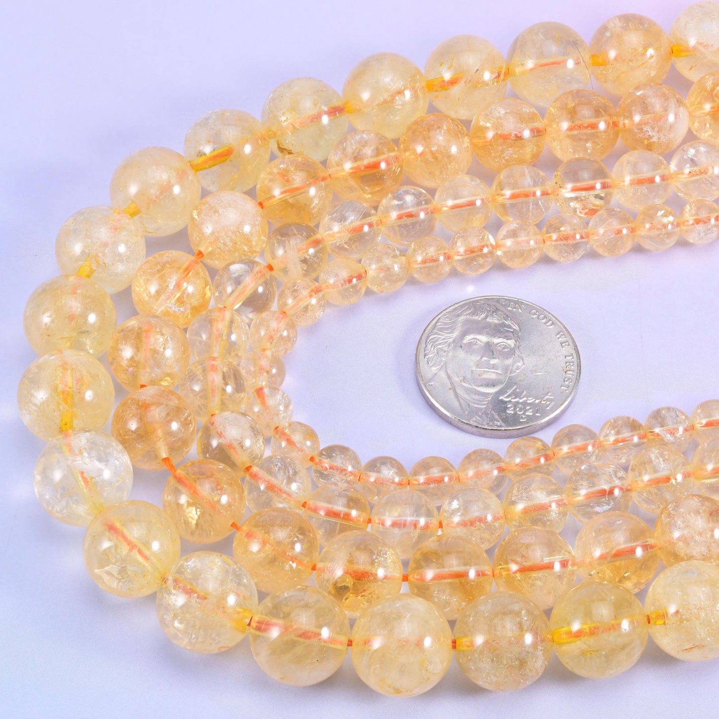 Citrine Smooth Round Beads 6mm 8mm 10mm 12mm in pale champagne gold through to warm honey yellow
