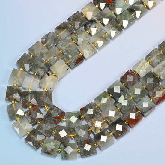 Natural African bloodstone faceted flat square beads in several strands curved into a wide U, gray-green and smoky gray stone with brick red spots