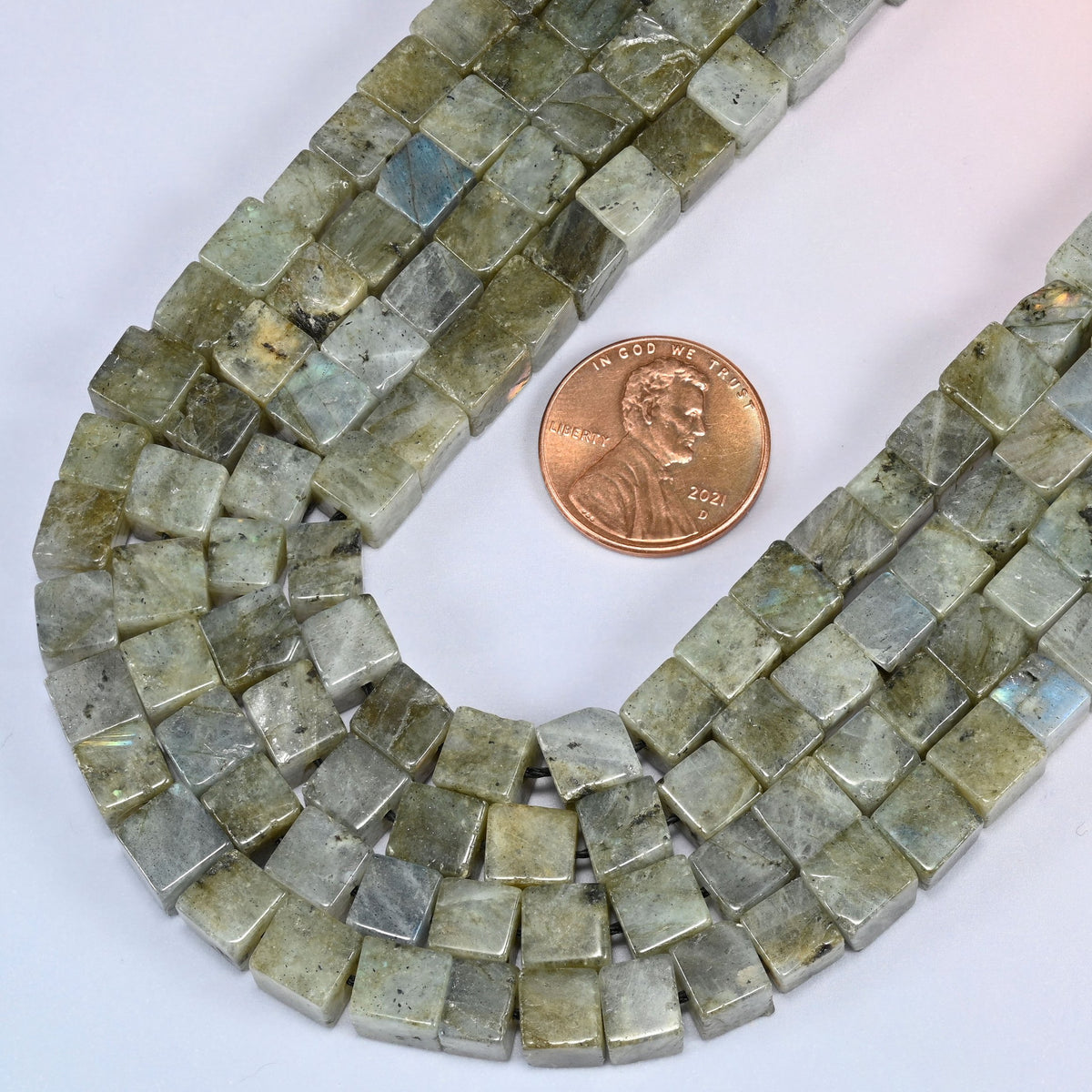Gray Labradorite cube beads in a deep loop, shown at their true size of 6mm
