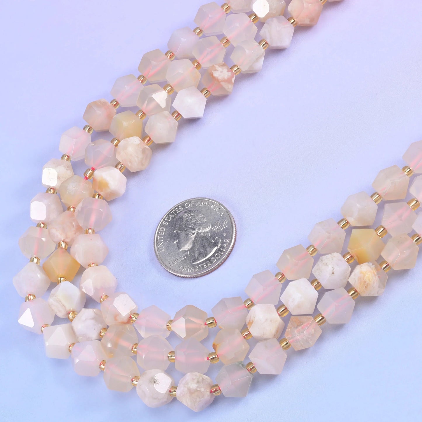 Faceted 8 sided diamond cut beads, centre drilled for beading wire and cord.