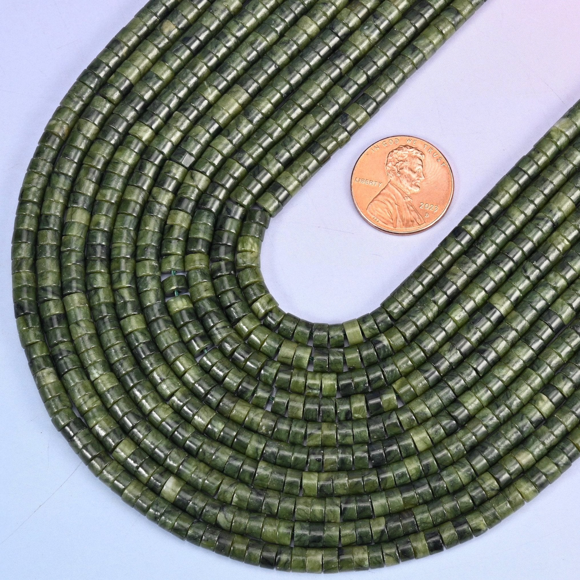 Smooth heishi disc cut South Jade beads