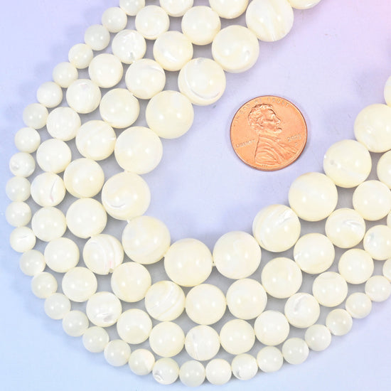 Round cut white trochus shell beads