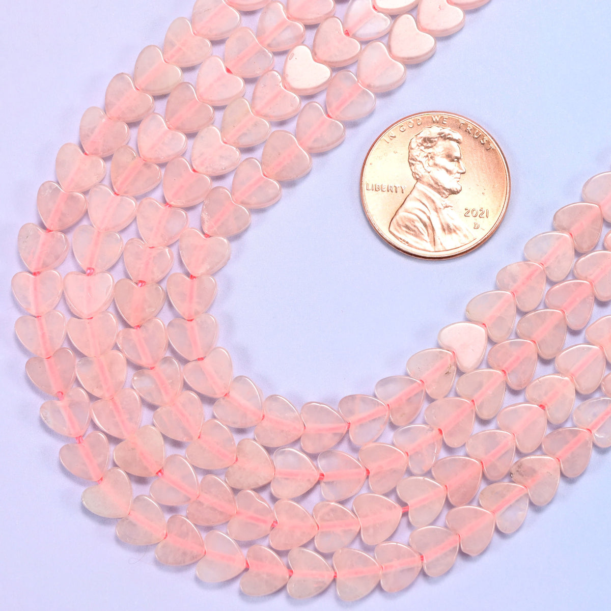 Flat heart cut rose quartz beads