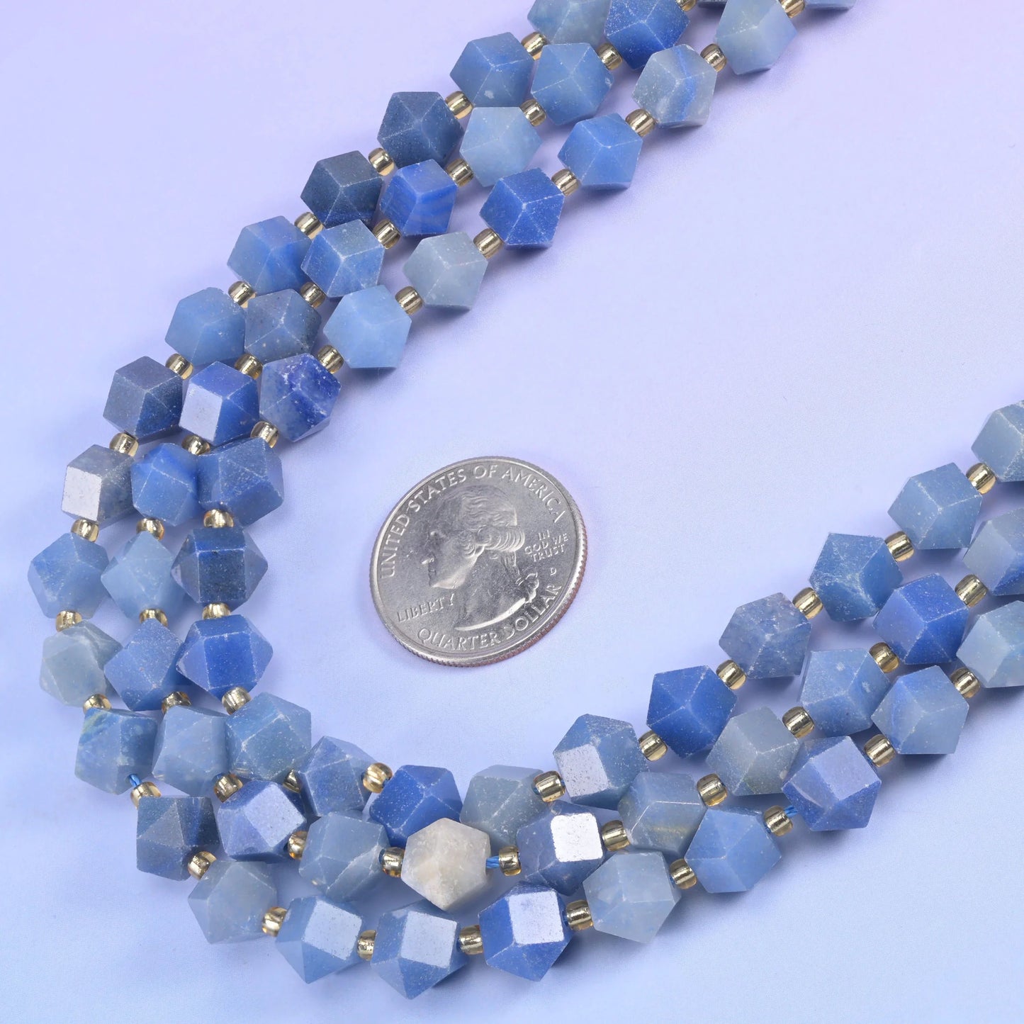Faceted diamond cut beads, soft pink and pale green among the colourways offered.