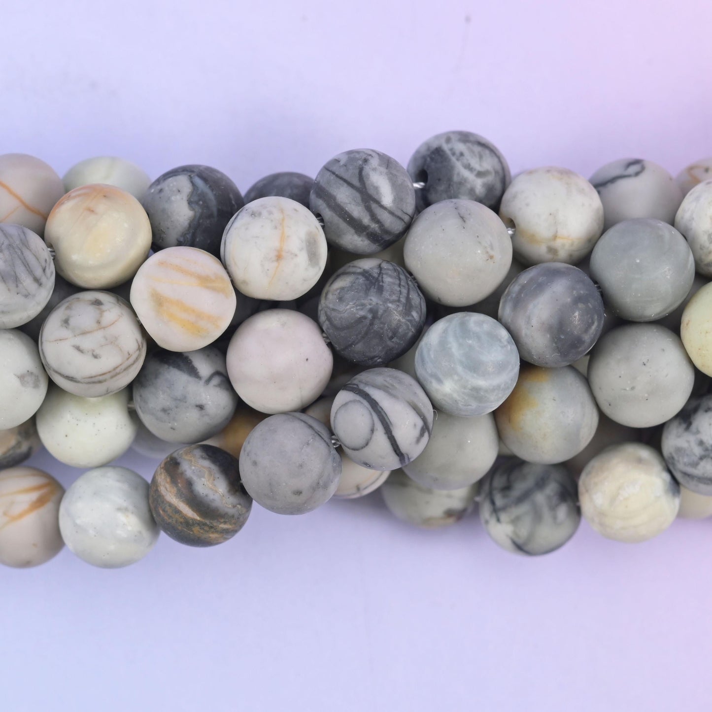 Matte round cut picasso jasper beads