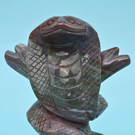 Indian Agate cobra figurine in mottled moss green and grey stone