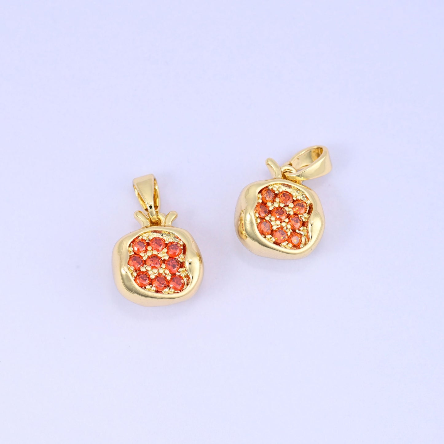 Pomegranate fruit zircon charm with clustered red zircon seeds