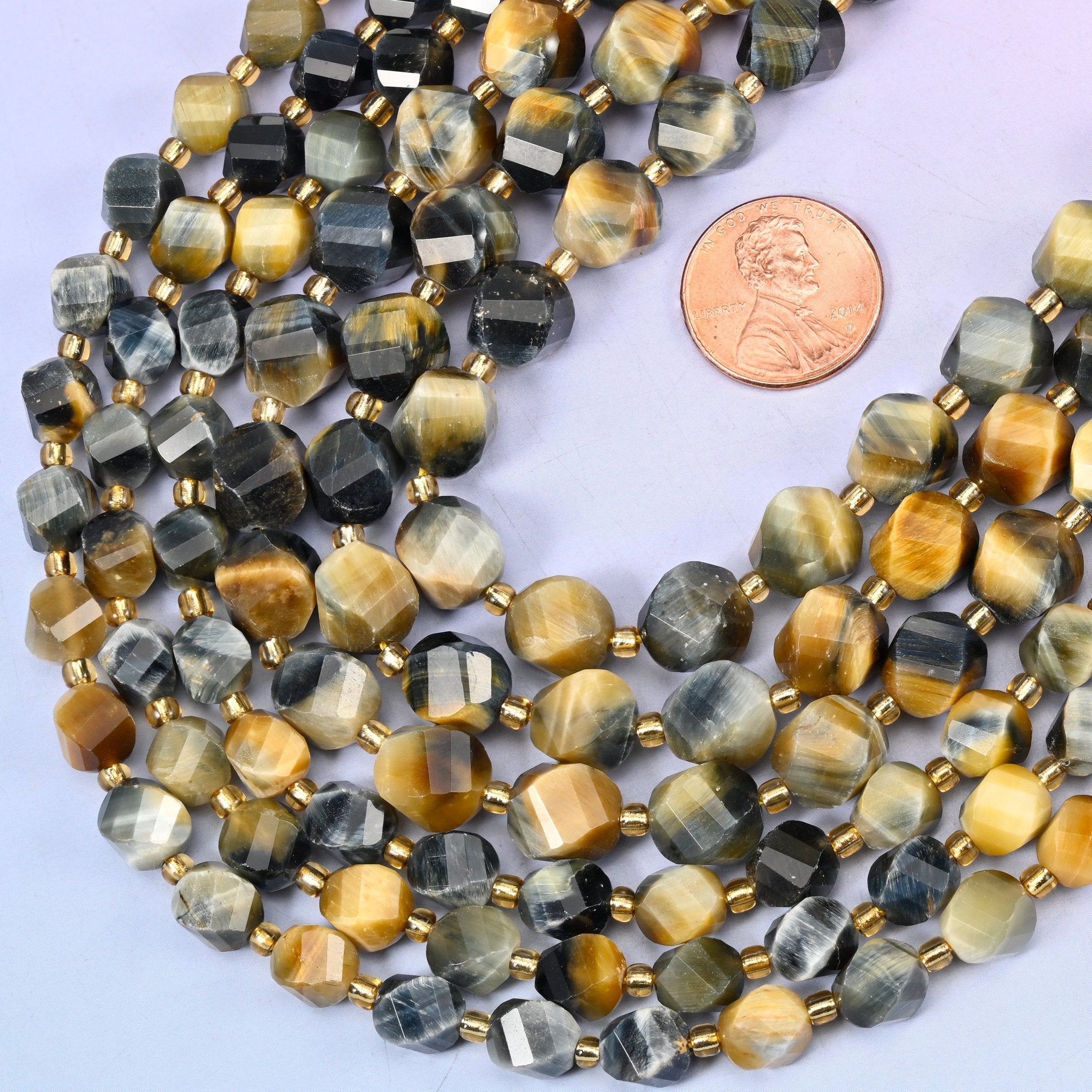 Faceted spiral twist cut Dream Tiger Eye beads