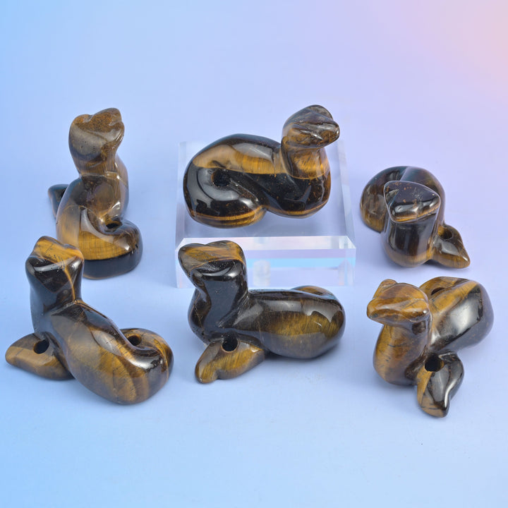 Snake Crystal Carving 2 Inches, a coiled snake carved from natural stone and buffed to a high shine.