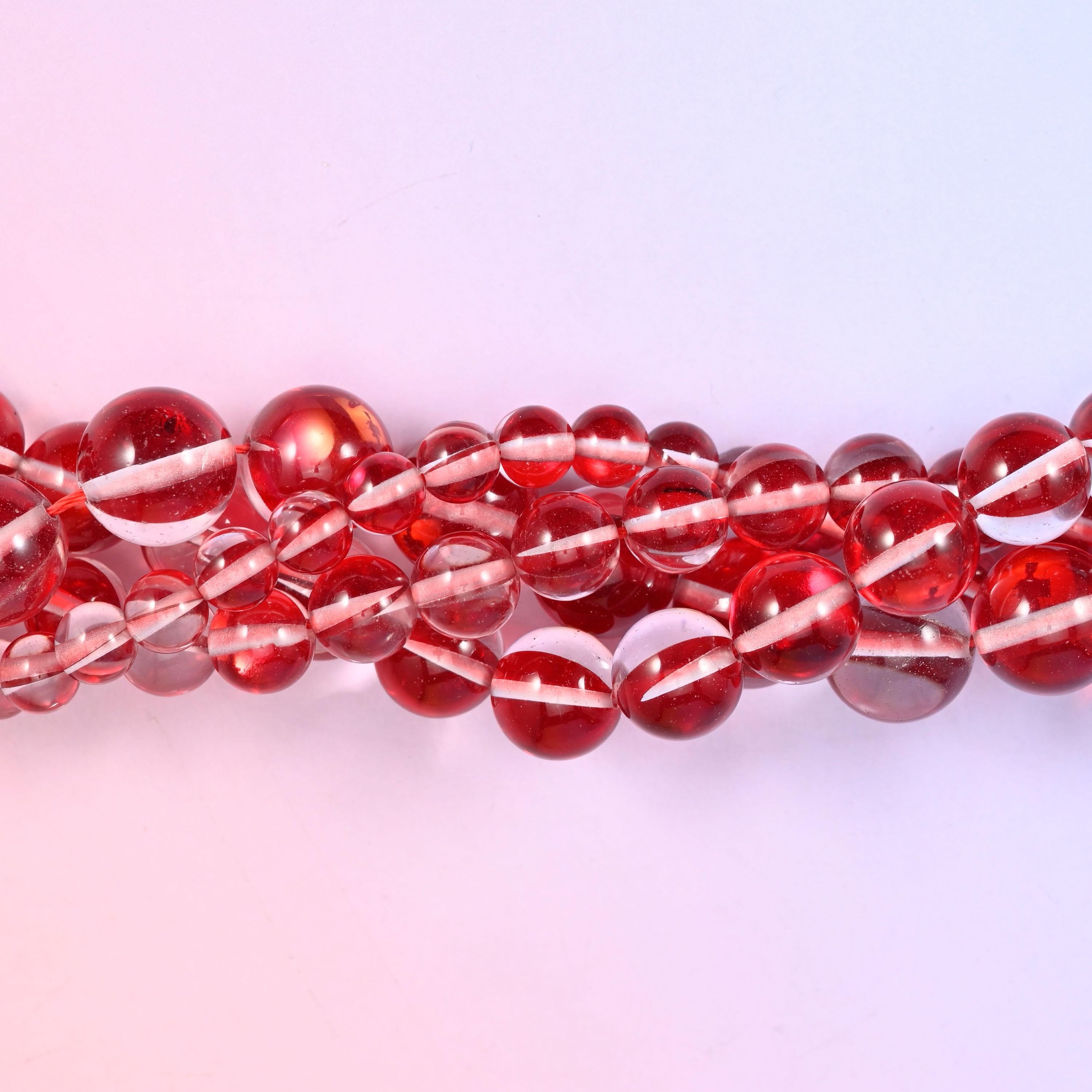 Bright cherry red transparent glass beads with an iridescent stripe