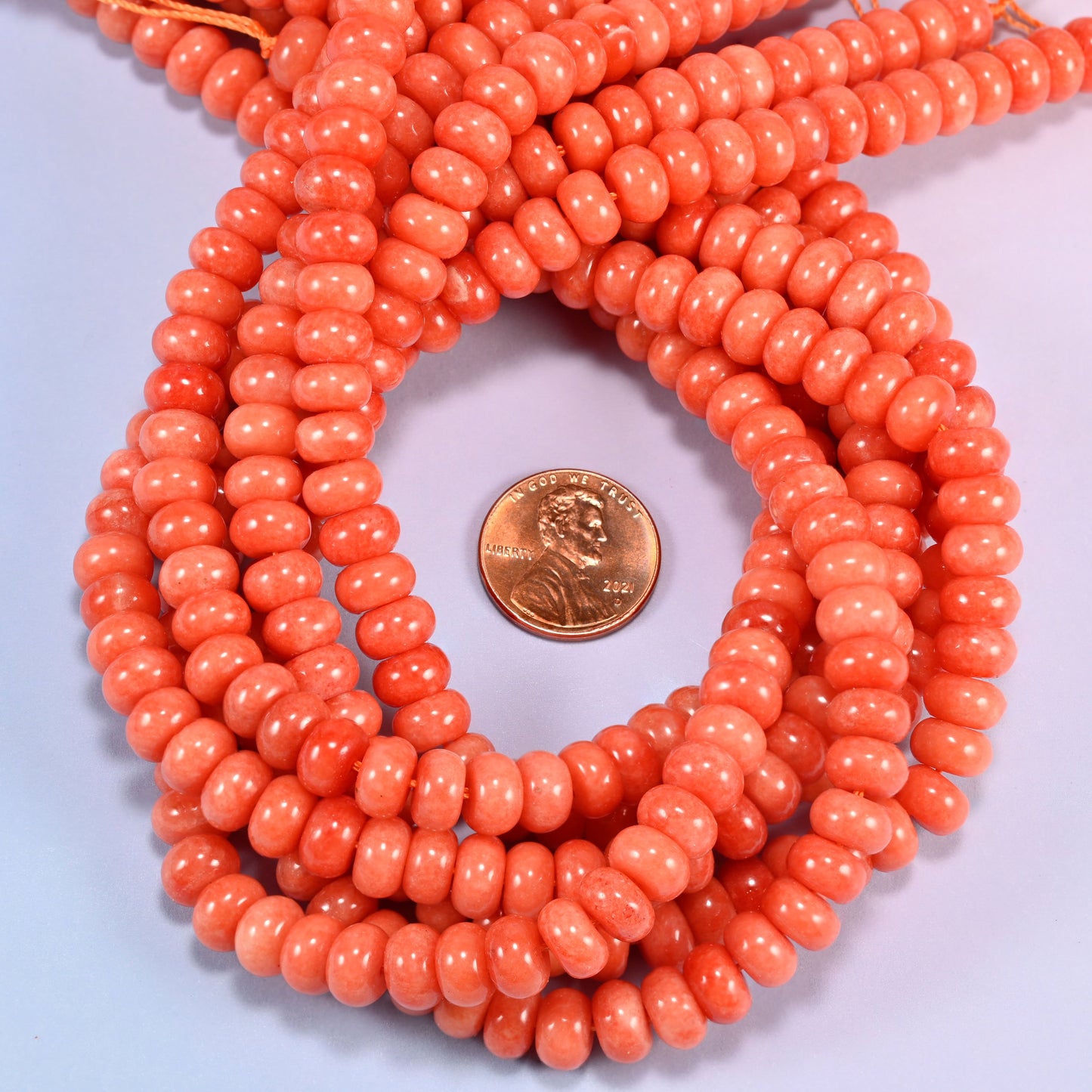 Red Orange dyed jade gemstone rondelle beads coiled flat, 5x8mm smooth discs on a 15 inch strand