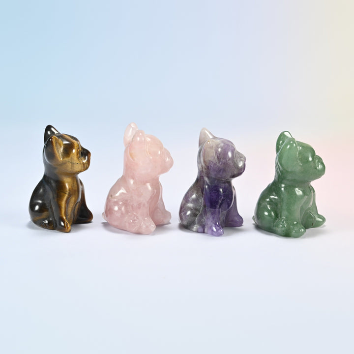 Side view of four gemstone Frenchie figurines showing the bat ears and sitting pose