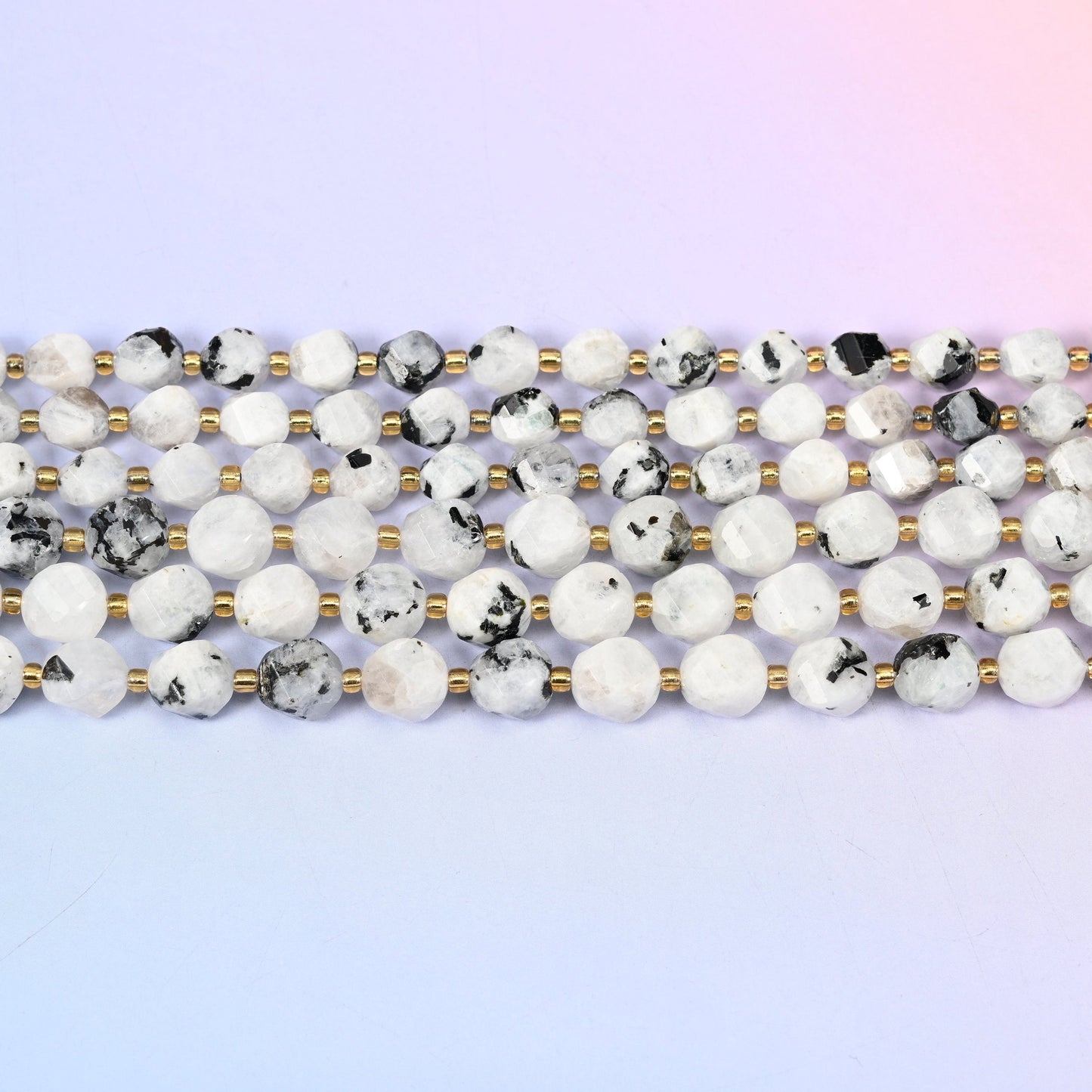 Blue Moonstone Faceted Spiral Twist Beads 8mm 10mm in milky white with charcoal and black speckling