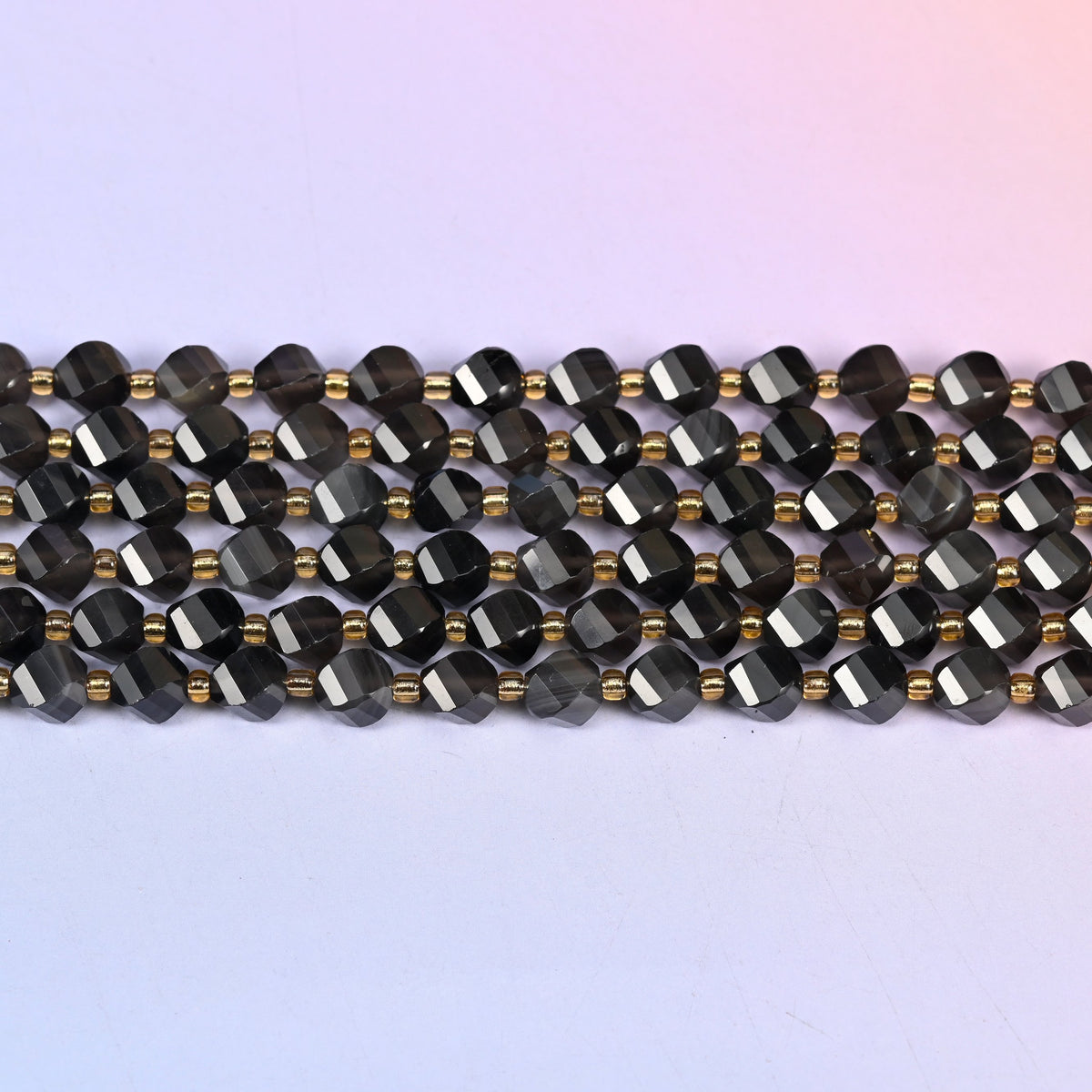 Ice obsidian natural stone beads mixing glassy near-black beads with lighter translucent smoke grey ones