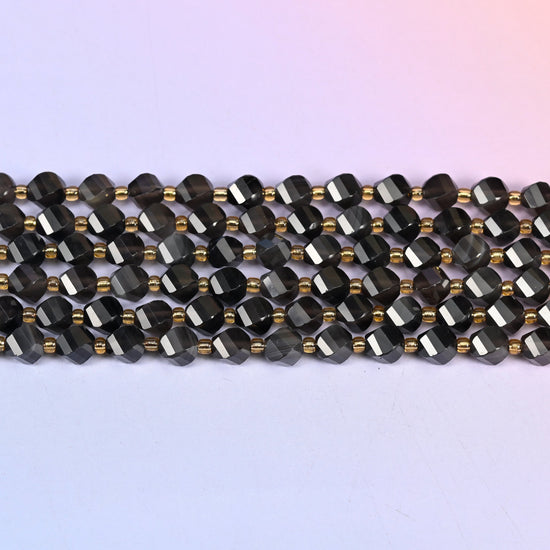 Ice obsidian natural stone beads mixing glassy near-black beads with lighter translucent smoke grey ones