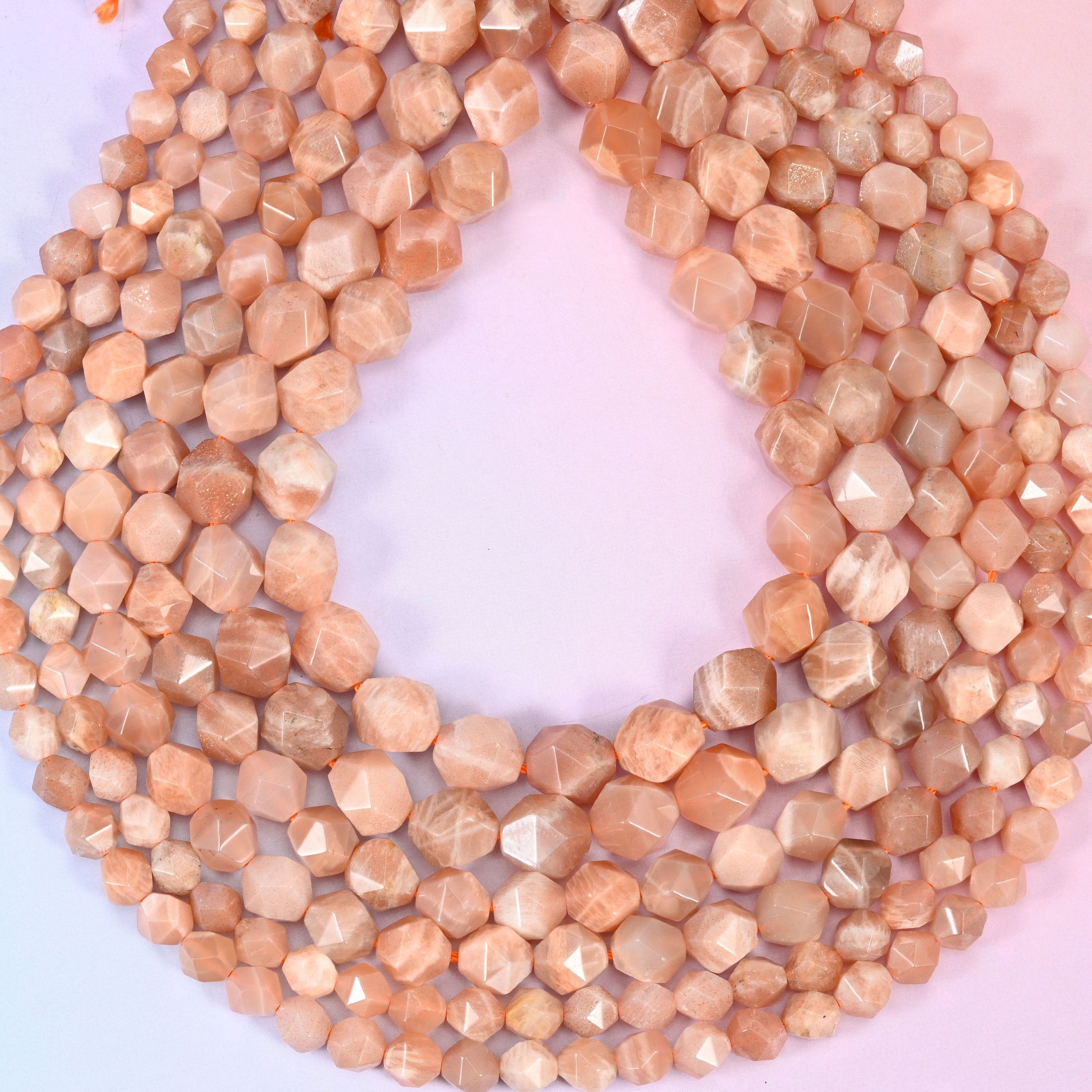 Sunstone diamond star cut beads, sold per 15.5 inch strand