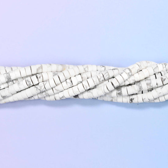 Matte white howlite heishi disc beads, approximately 155 per strand