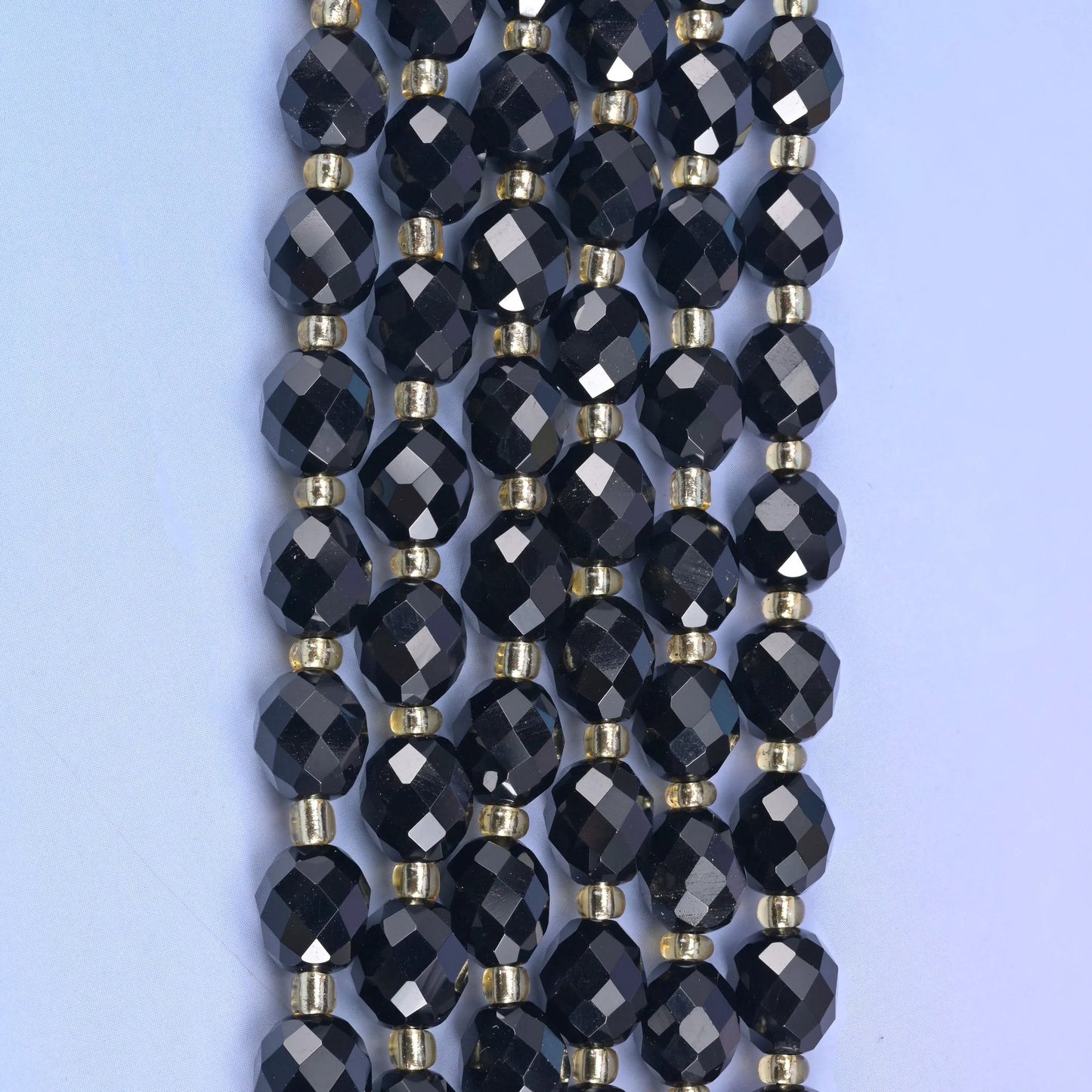 Black Onyx rice barrel beads, drill hole approximately 1.0mm, centre drilled.