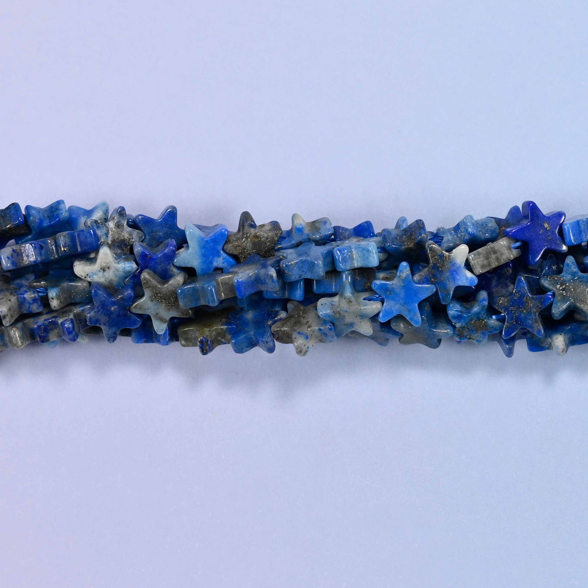 Lapis lazuli flat star beads, approximately 75 per strand