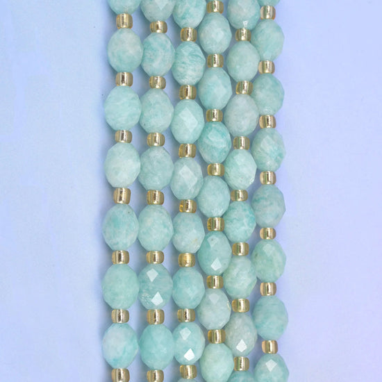 Faceted rice barrel cut green amazonite beads