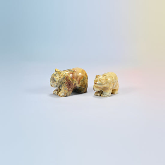 A 2 inch and a 1.5 inch crazy agate bear crystal carving, cream, tan and red-brown natural stone