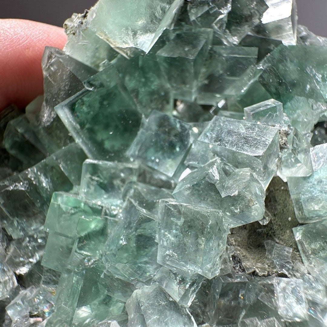 Moss green cubic Fluorite mineral specimen weighing 9 oz