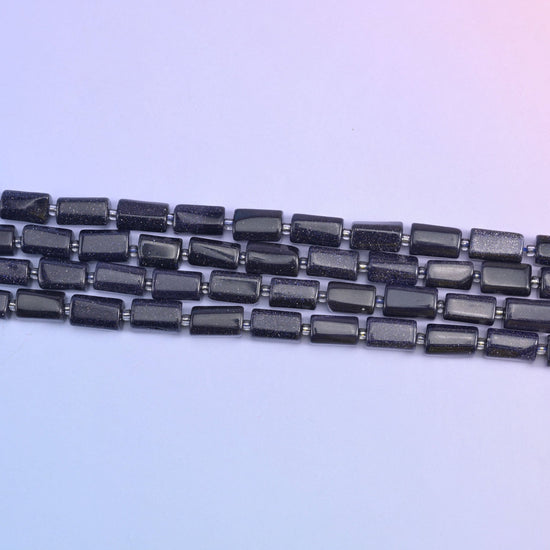 Blue Sandstone Faceted Tube Beads 12x8mm in deep sparkling blue