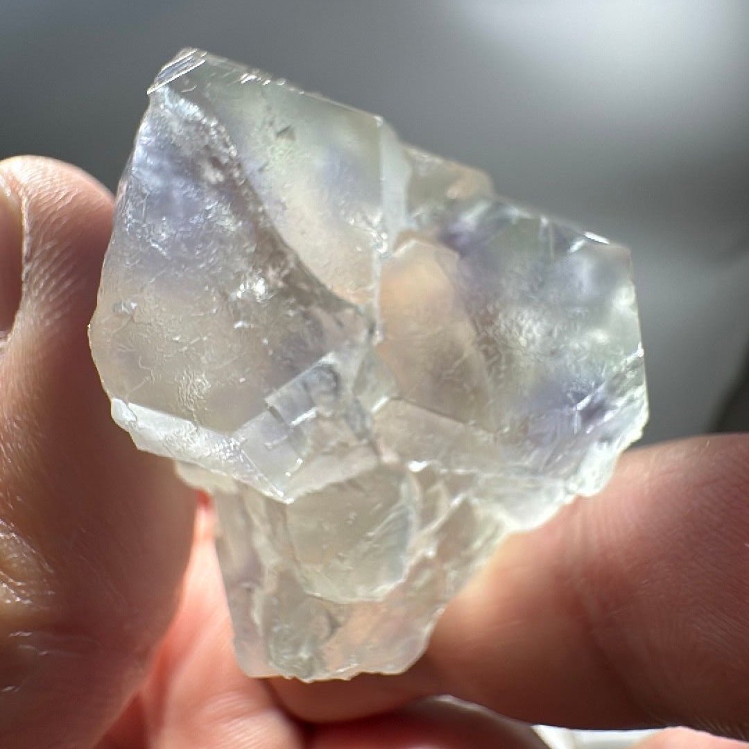 Angled view of the cubic fluorite showing its narrow 30mm width