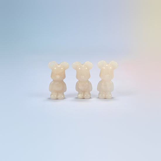 Three 1.5 inch pink aventurine power bear crystal carvings, creamy peach natural stone