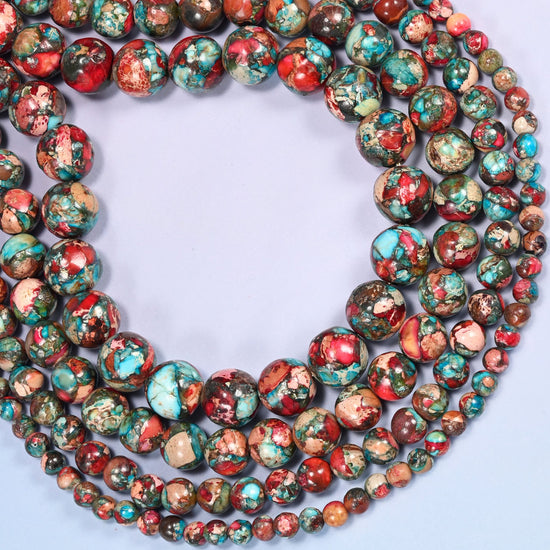 Red sea sediment jasper round beads coiled into a wide open ring with a large open center.