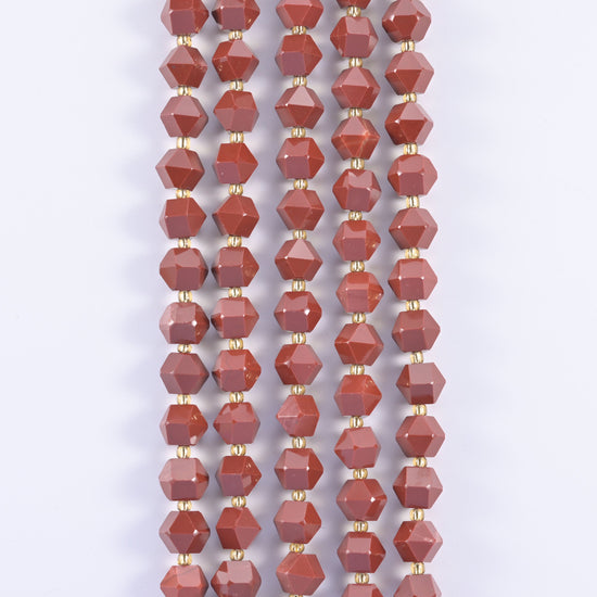 Faceted eight-sided gemstone beads, mottled green and speckled colourways offered.