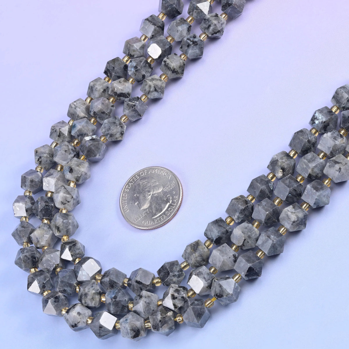 Faceted diamond rhombus beads, 15.5 inch strand