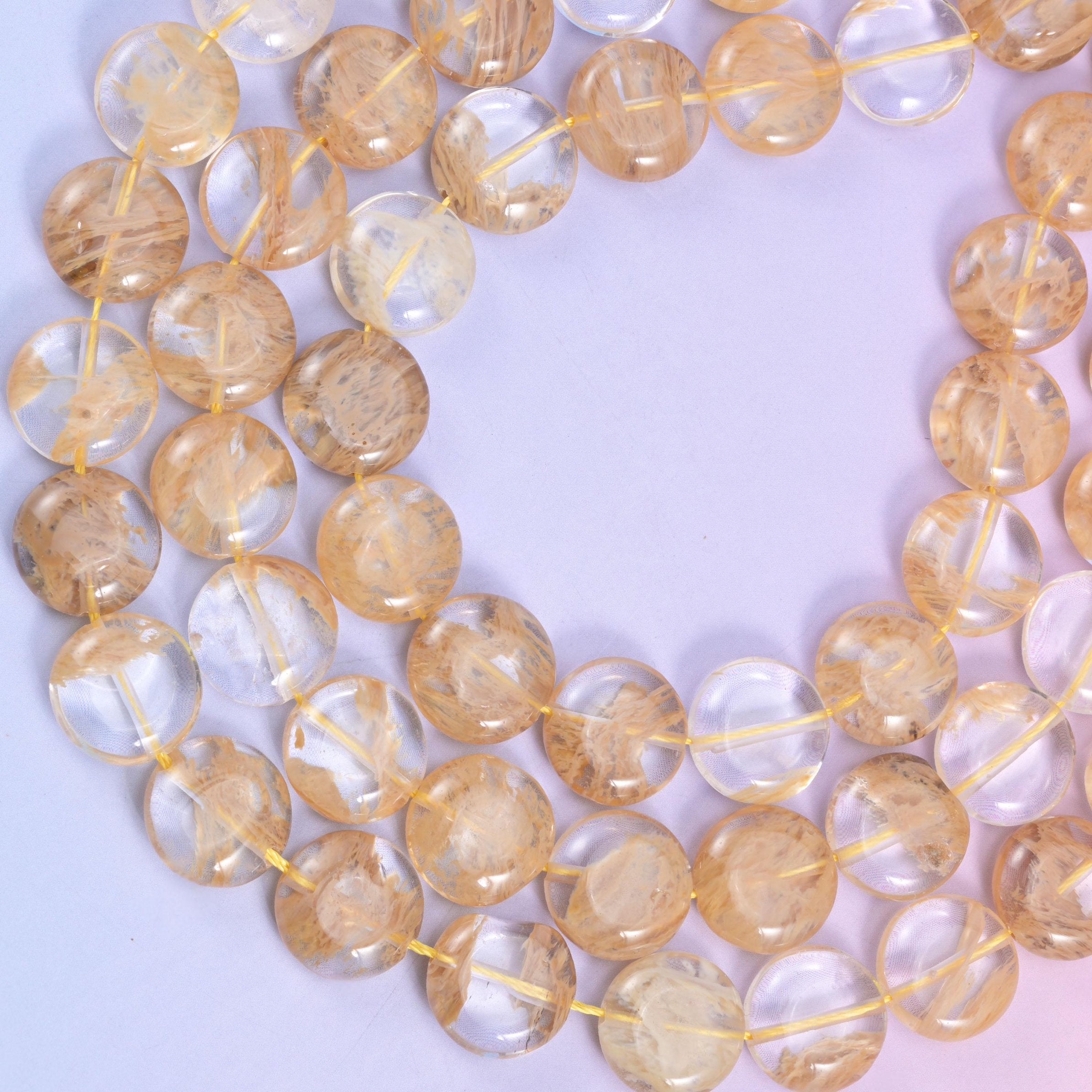 Yellow watermelon quartz coin beads, approximately 26 beads per strand