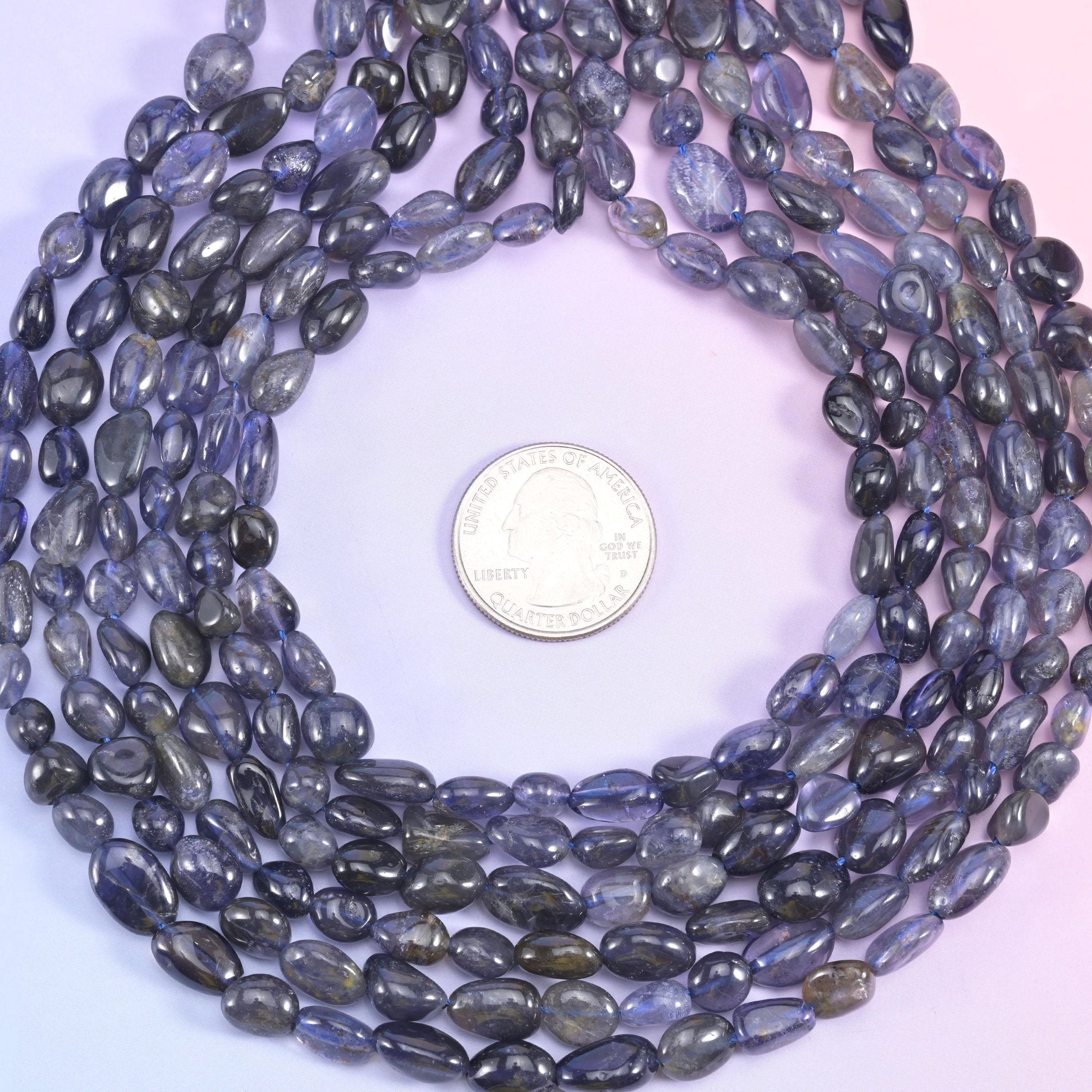 Iolite pebble nugget beads, approximately 46 beads per strand