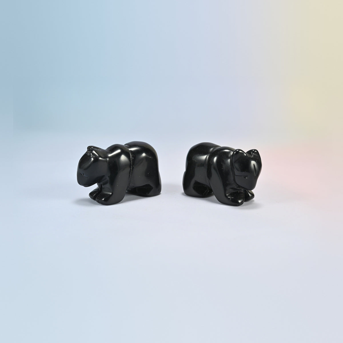 Two 2 inch black obsidian bear crystal carvings, glossy black natural stone