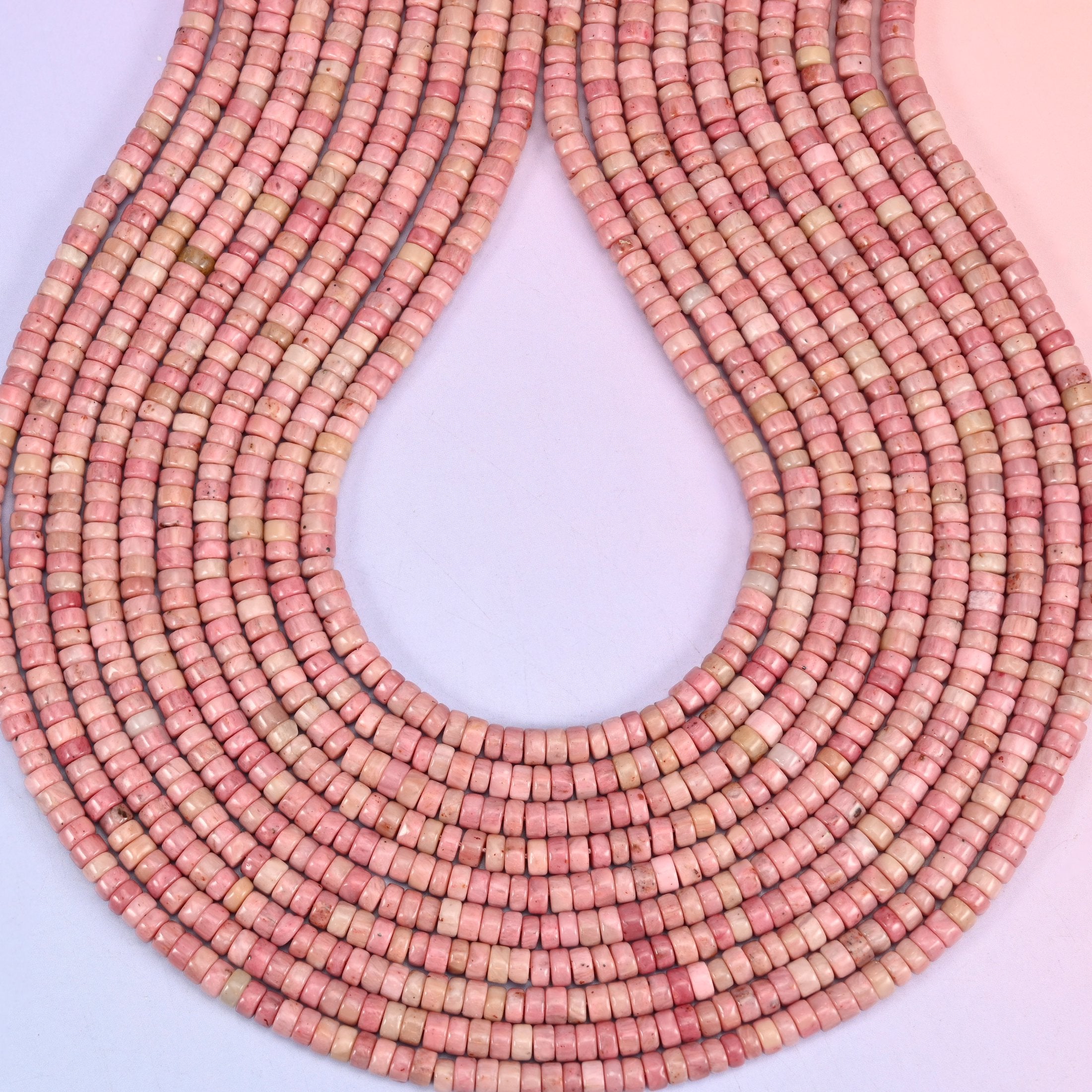 Pink Rhodonite heishi beads, center-drilled 1.0mm hole.
