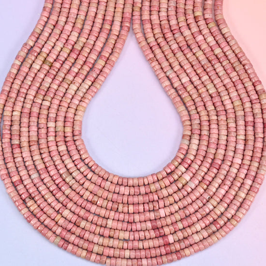 Pink Rhodonite heishi beads, center-drilled 1.0mm hole.