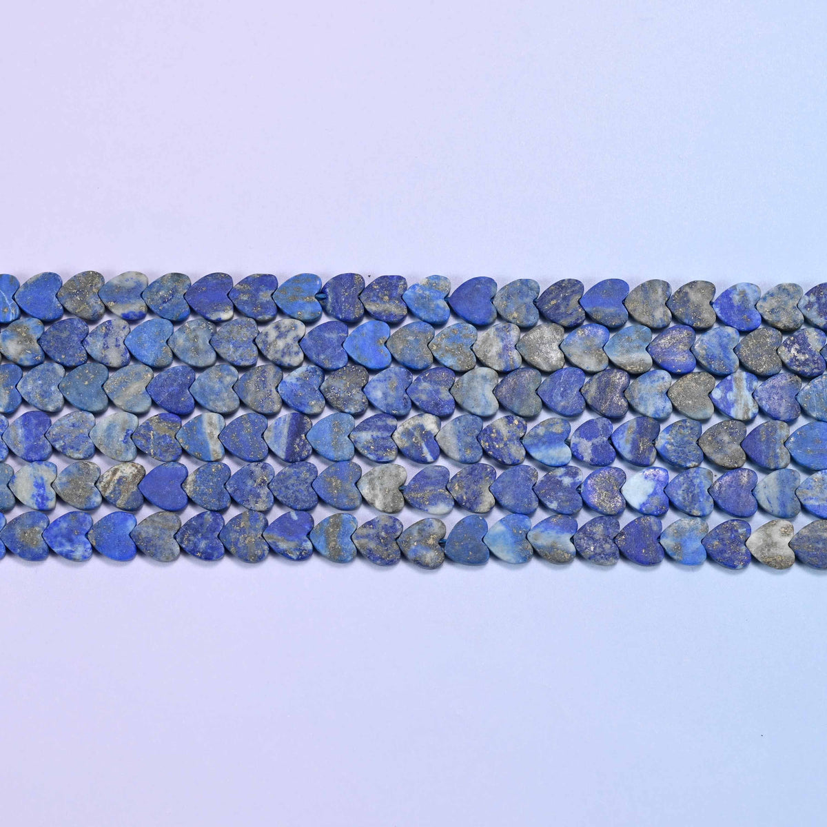 Lapis lazuli beads in deep denim blue marbled with grey and chalk white