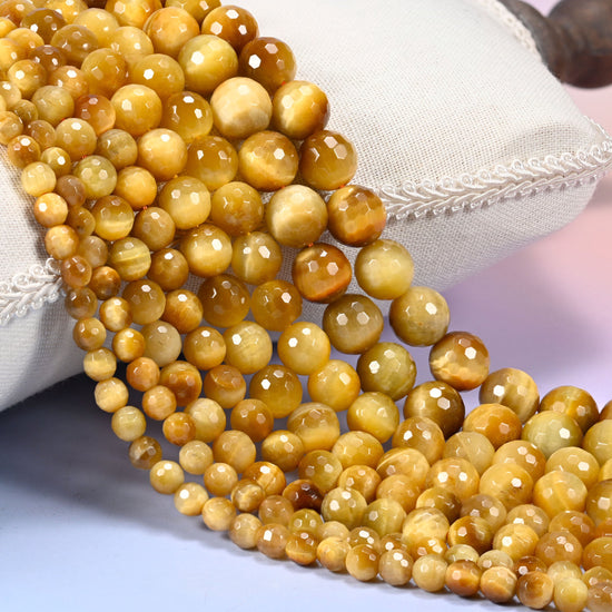Golden brown gold tiger eye faceted round beads in 6mm, 8mm, 10mm, and 12mm, 15-inch strand, for jewelry making.
